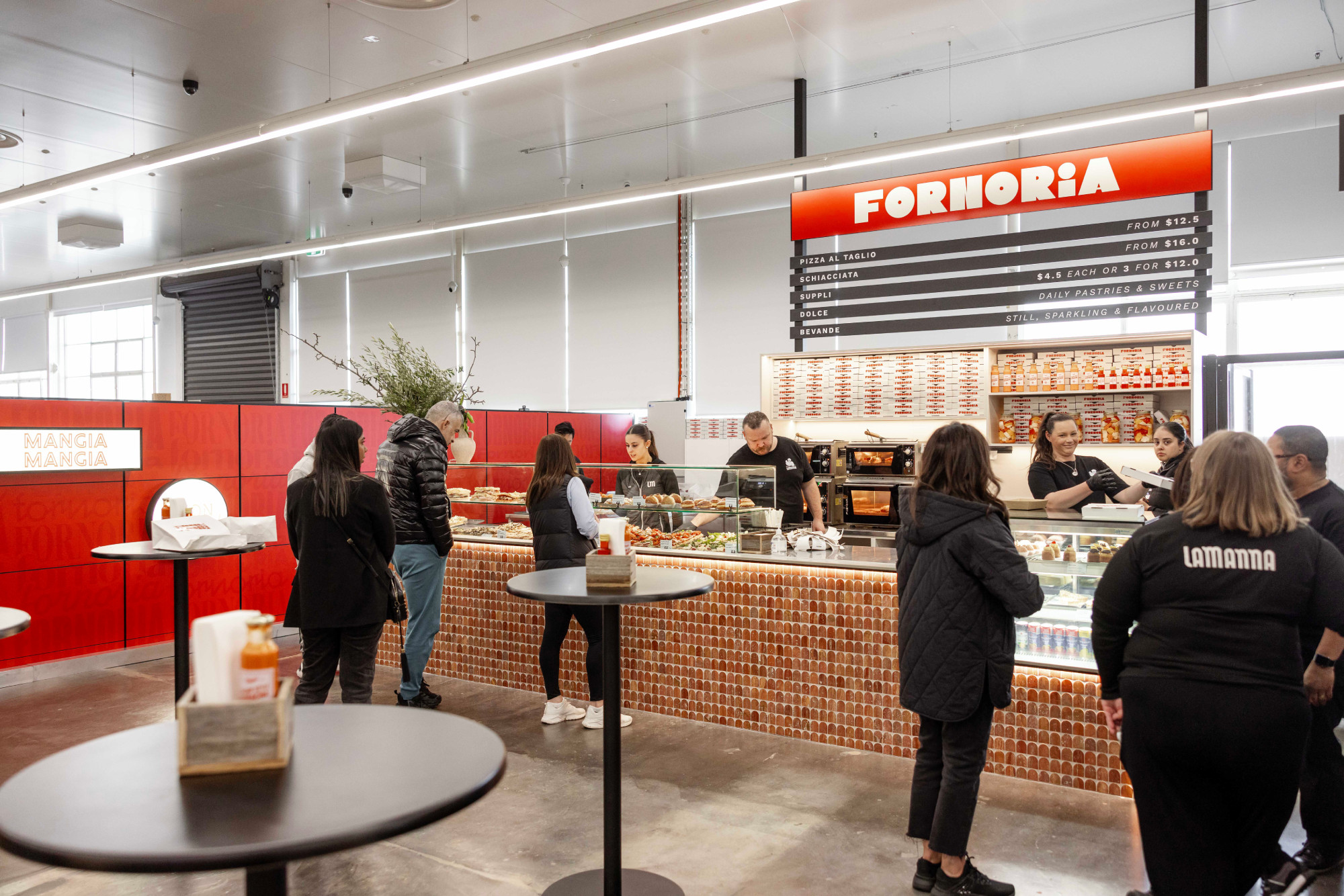 Fornoria at LaManna Essendon Fields with people standing around