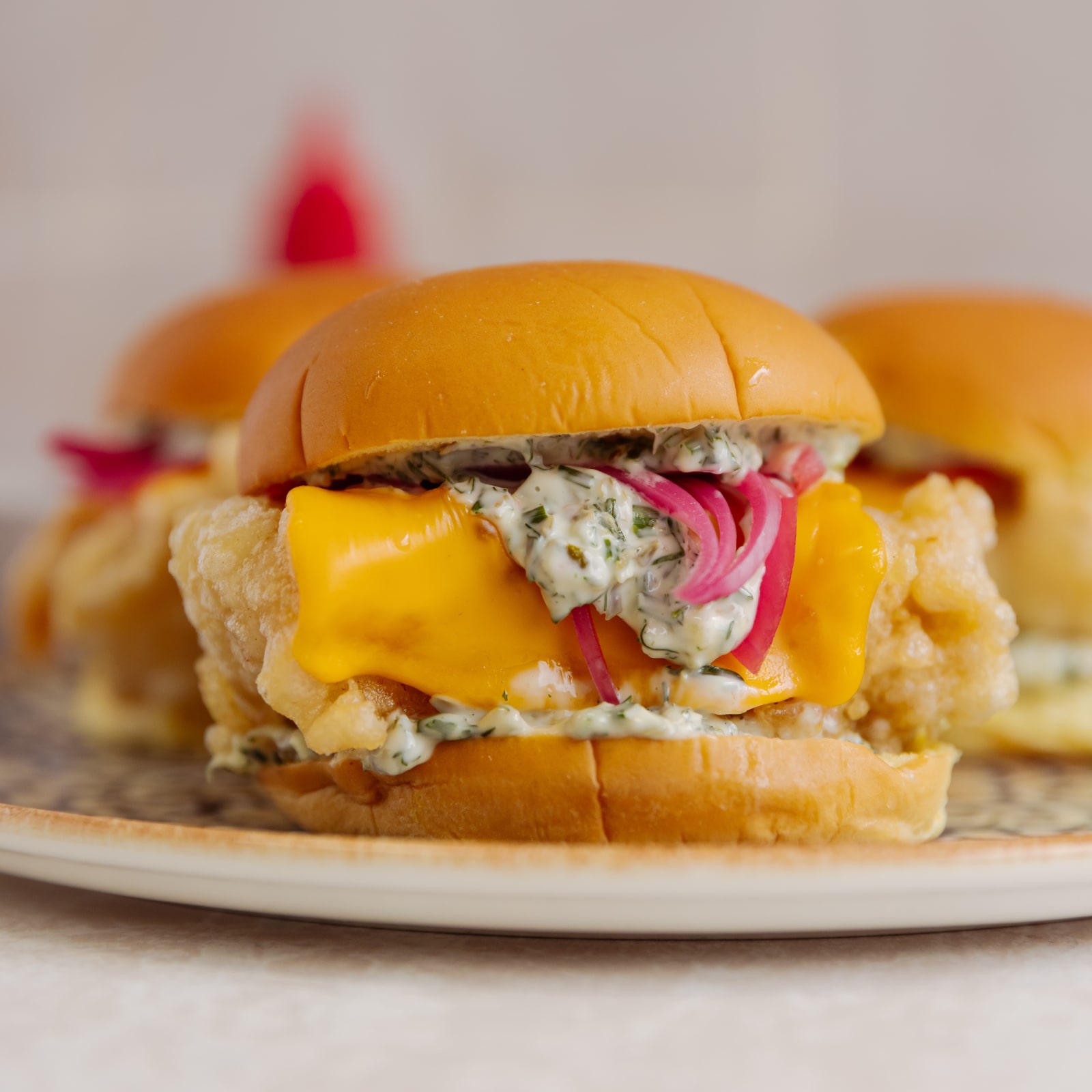 rockling burger recipe with tartare sauce and red pickled onion