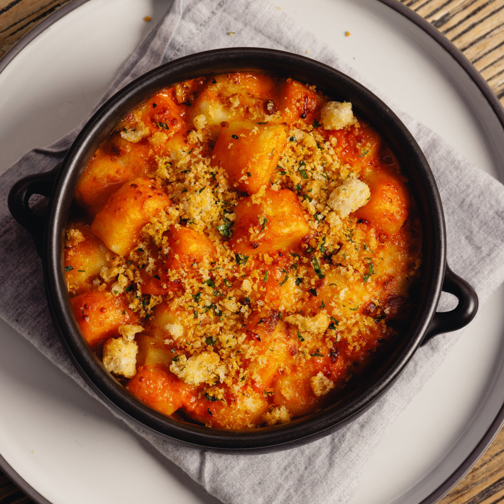 Baked gnocchi with tomato sauce and cheese served for lunch at LaManna Café Essendon Fields