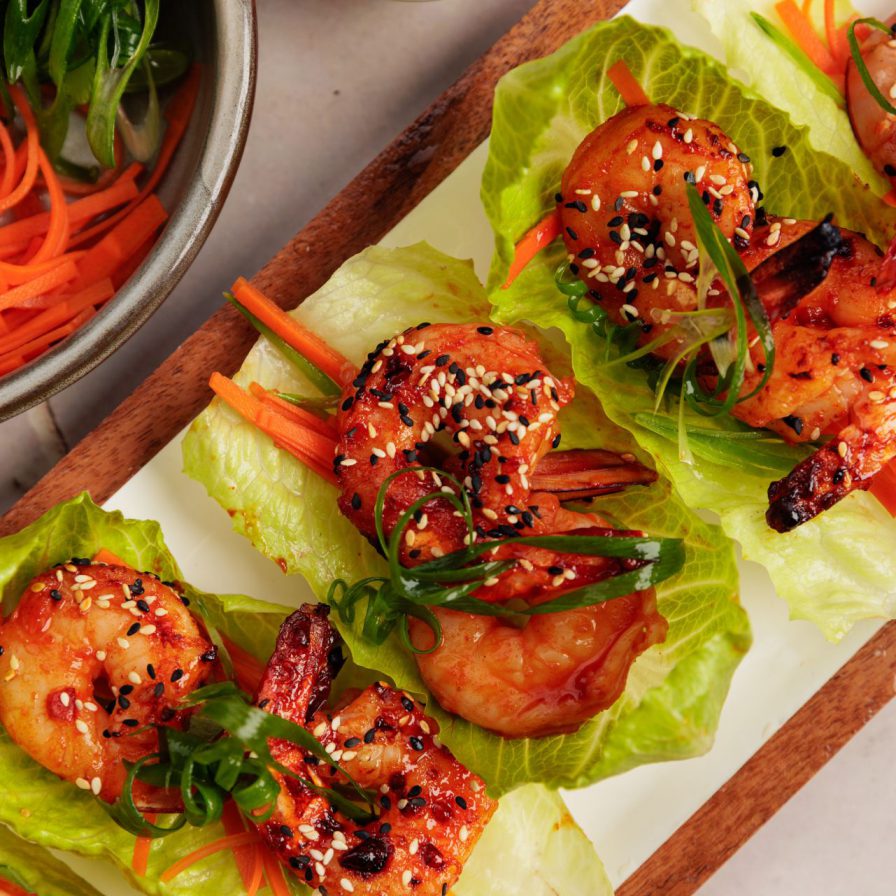 sweet chilli prawn lettuce cups on serving board