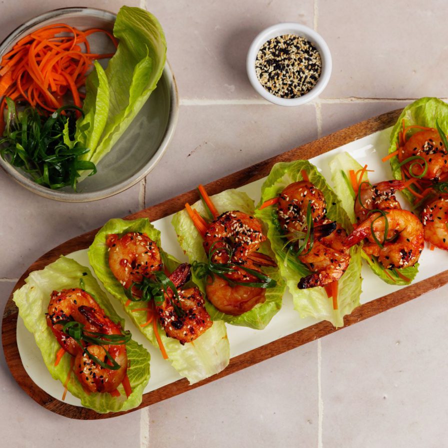 sweet chilli prawn lettuce cups on serving board